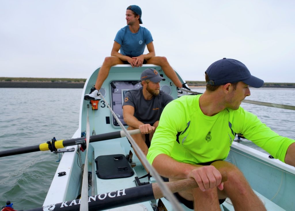 Jimmy and teammates rowing in training