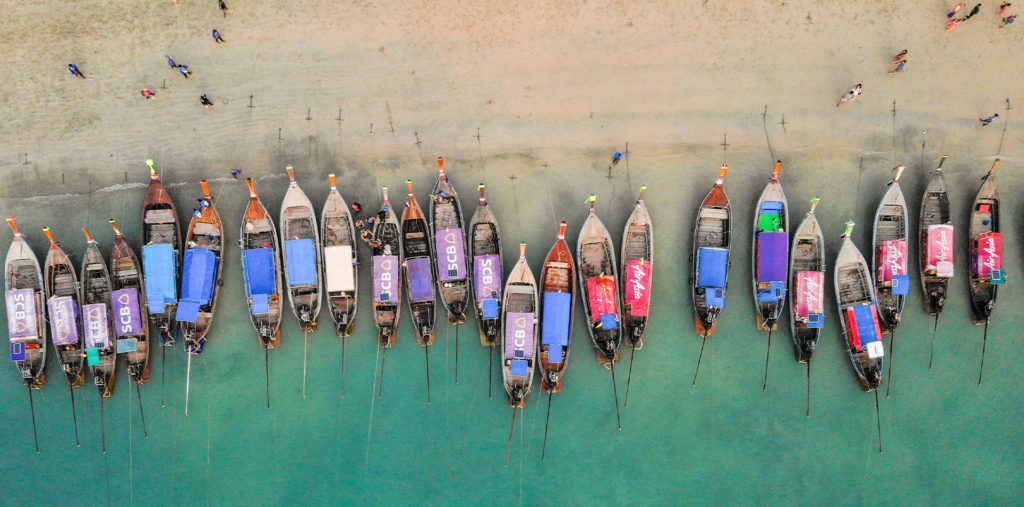 fishermen boats krabi beach thailand
